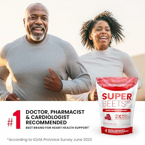 Smiling couple jogging with SuperBeets supplement packaging.